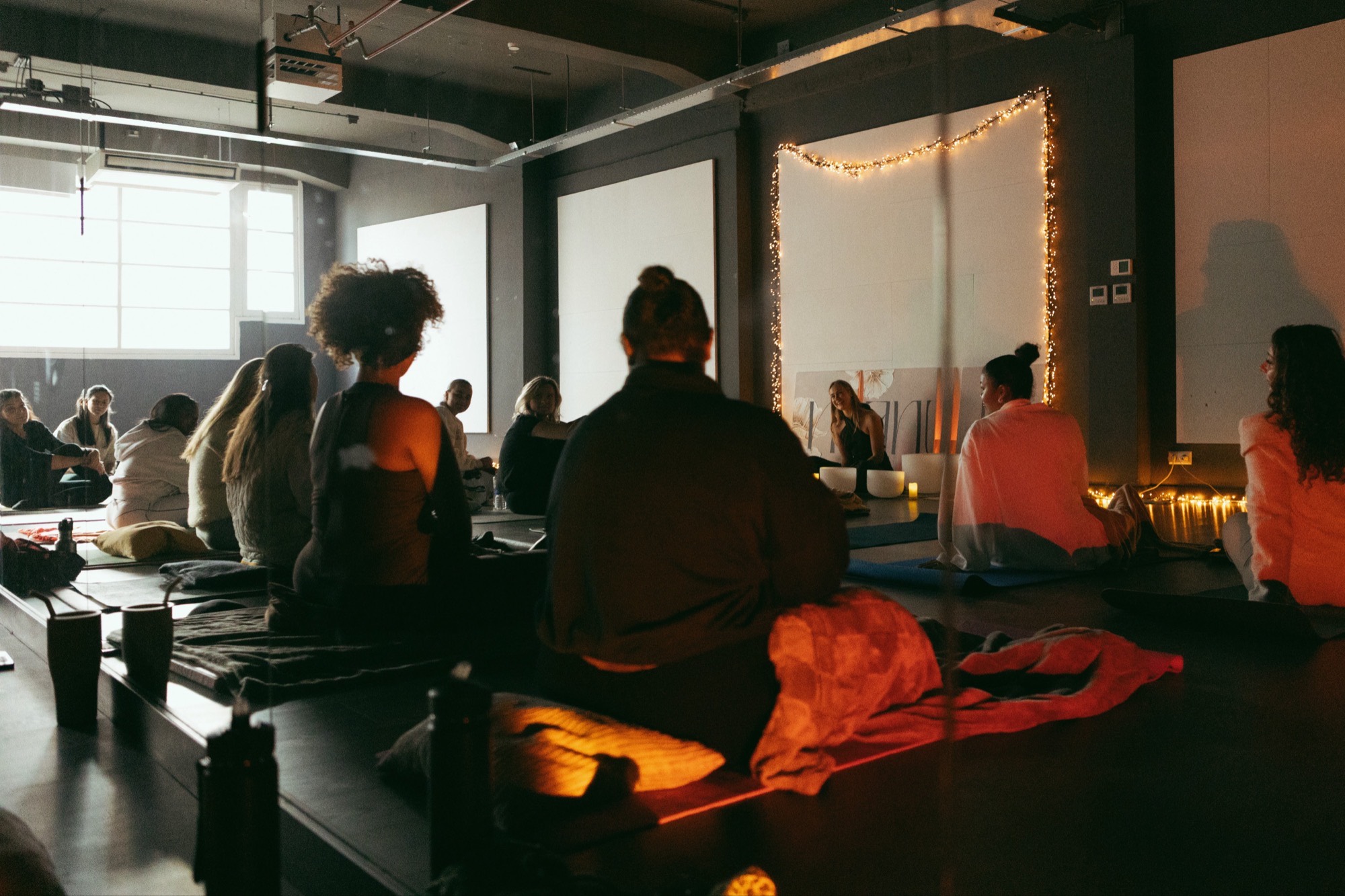A group sound healing session in the Tune In space in Rotterdam